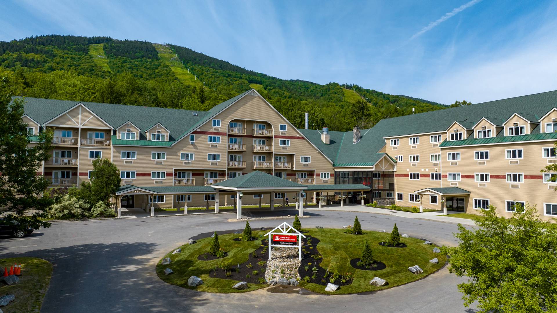 The exterior of the Grand Summit Hotel at Sunday River in the summer.