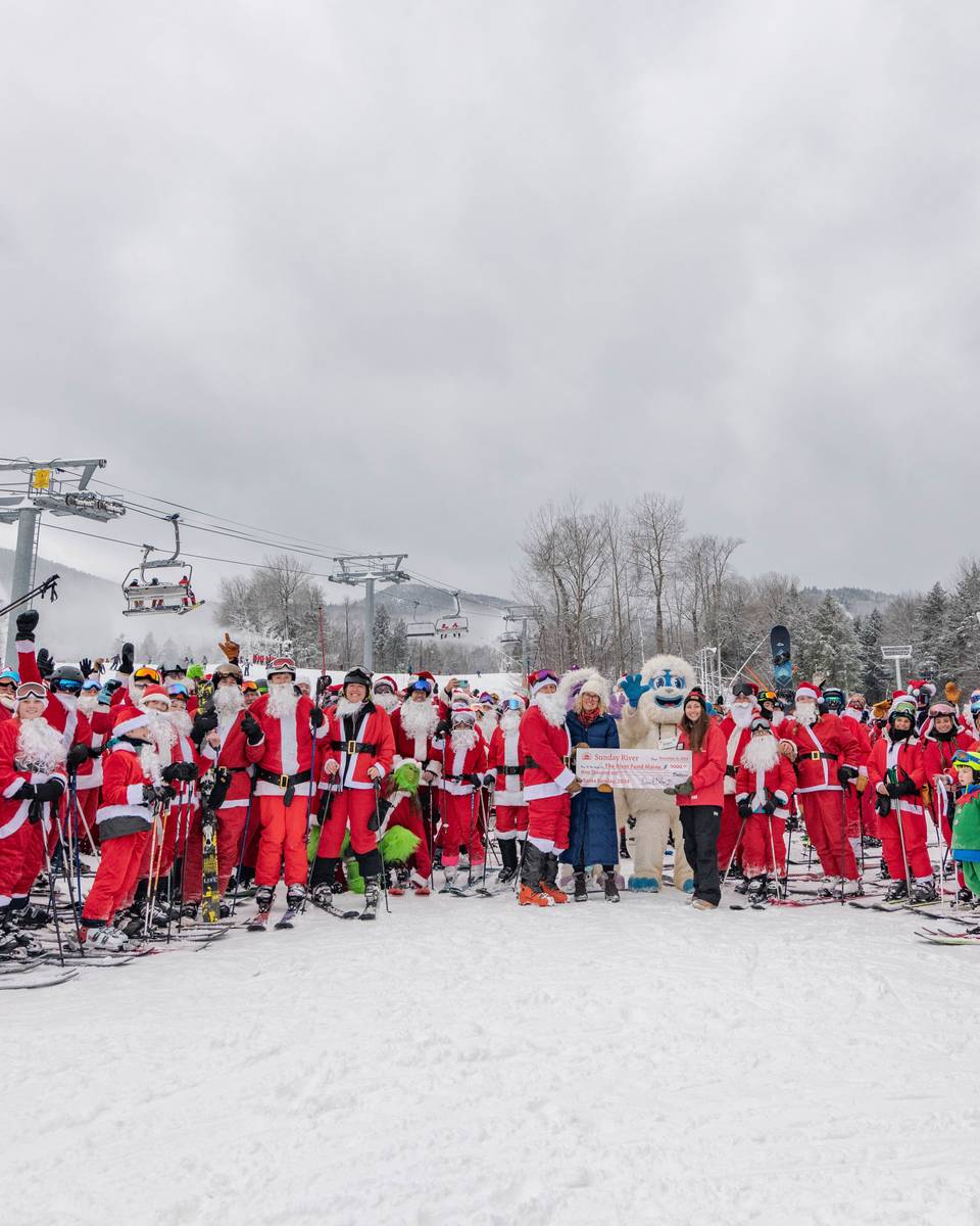 A group photo supporting The River Fund Maine for Santa Sunday at Sunday River.