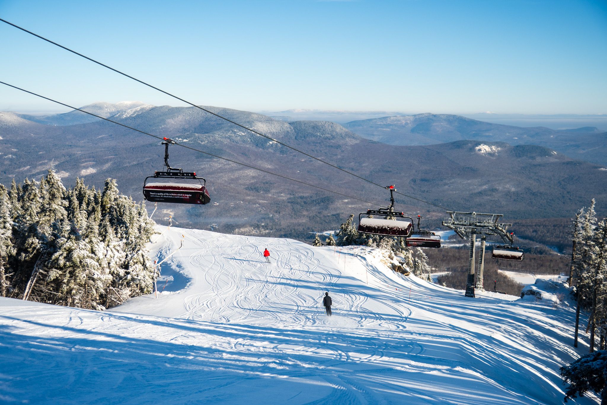 Jordan 8 chairs over a trail at Sunday River.
