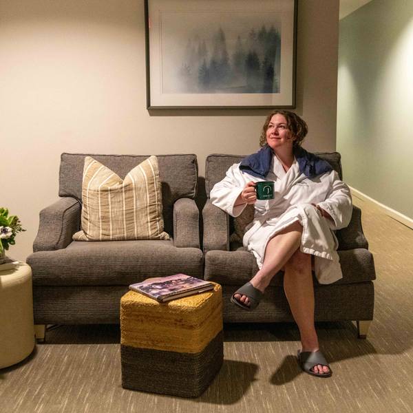 A woman relaxing inside the Jordan Spa at Sunday River.