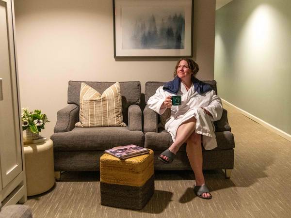 A woman relaxing inside the Jordan Spa at Sunday River.