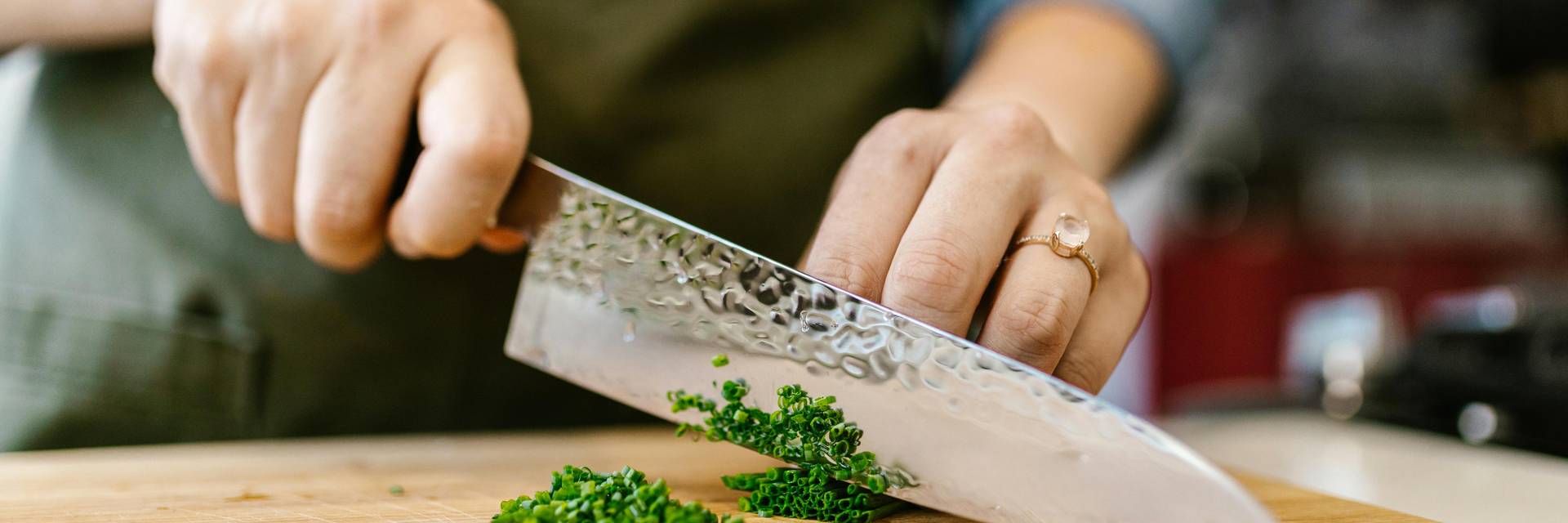 A chef cutting cilantro at the Chef Summit at Sunday River.