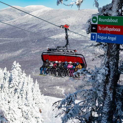Skiers and riders on the Jordan 8 at Sunday River