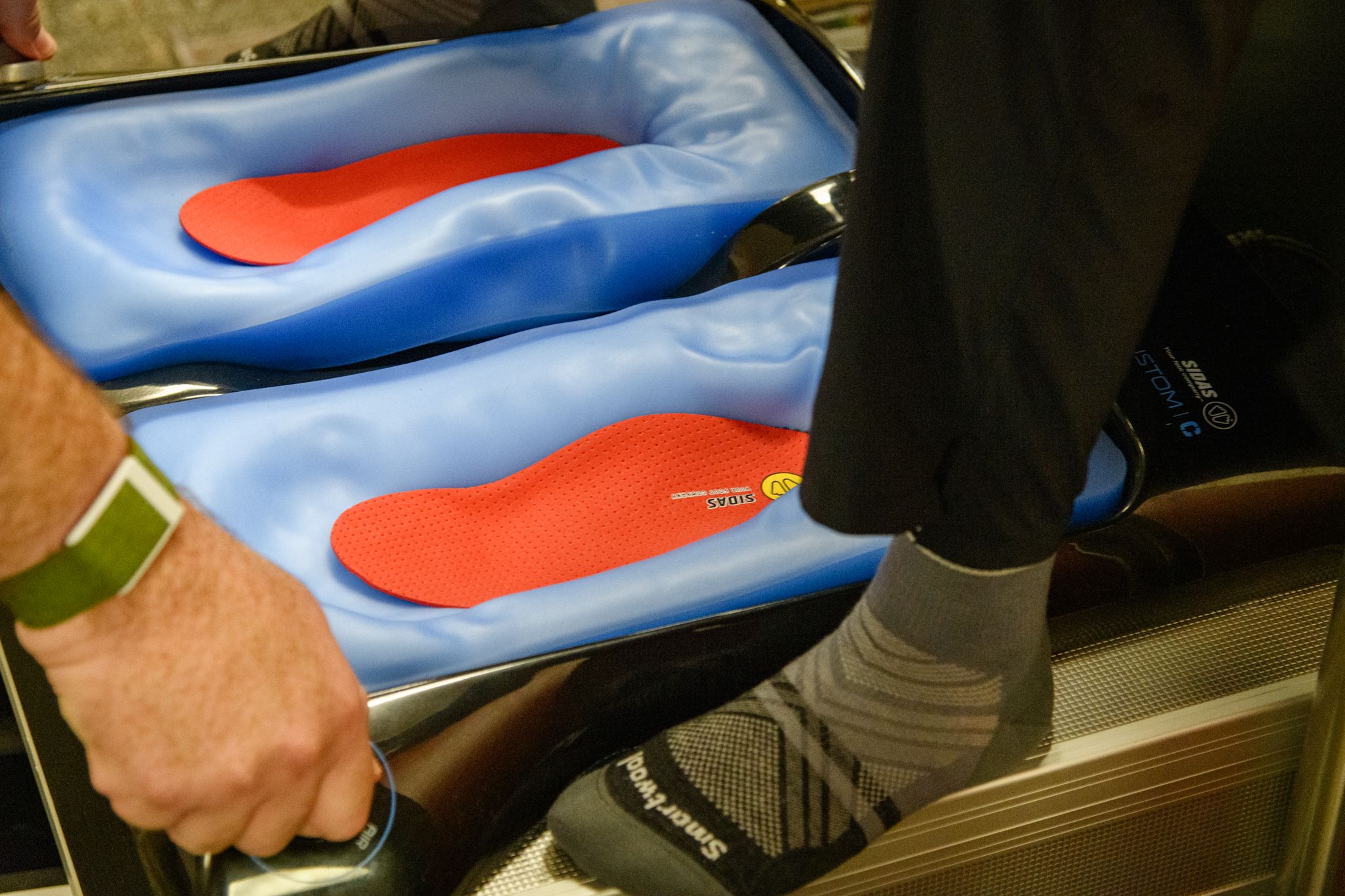 Forming the insoles for the custom footbeds.