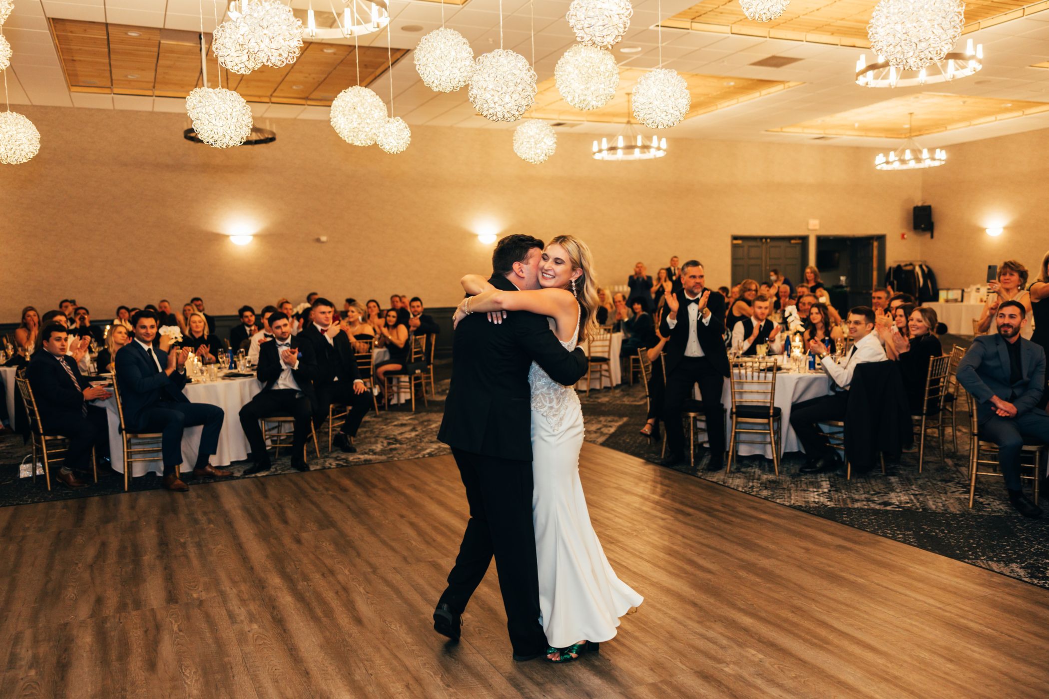 Husband and wife dancing in the Grand Summit Ballroom.