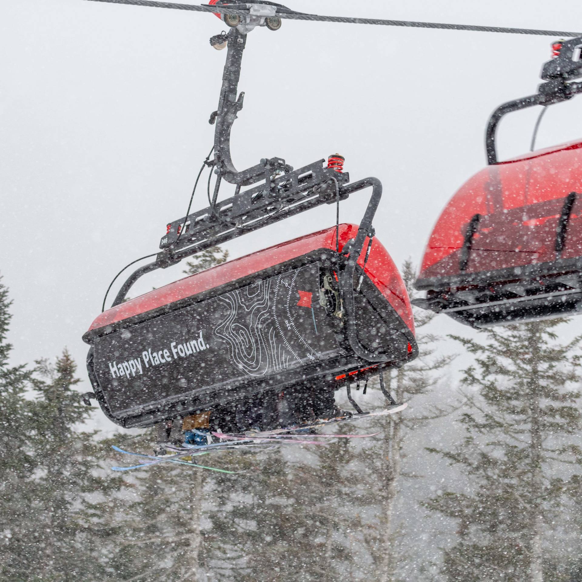 Snow falling on the Jordan 8 chairlift at Sunday River.