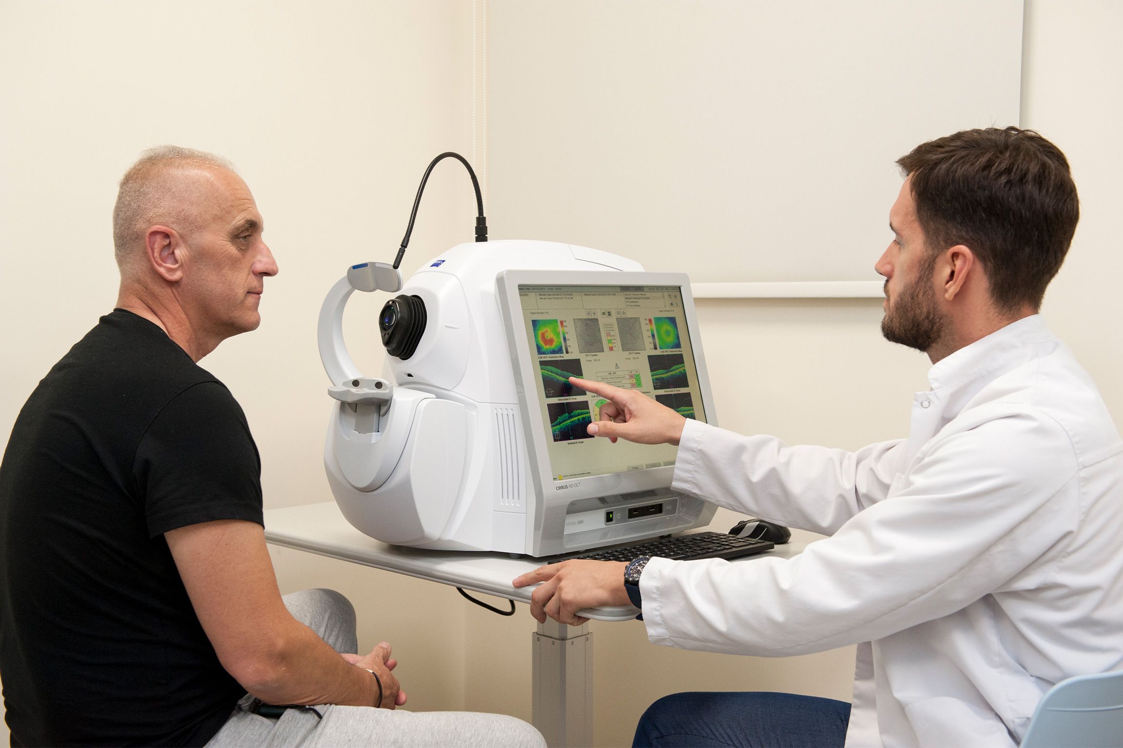 The doctor showing the patient the examination results