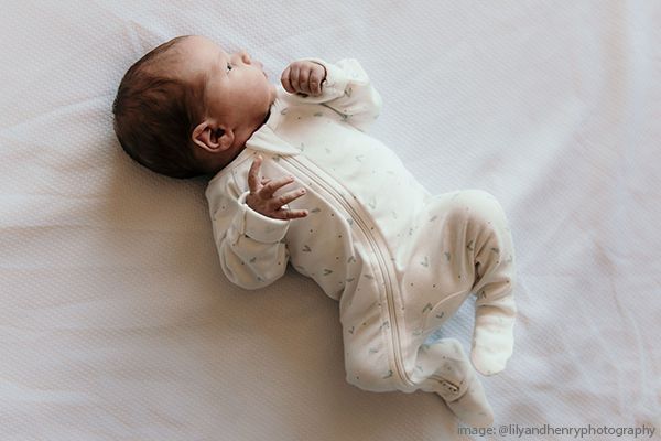 Purebaby x Epworth Growsuit on baby