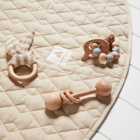 Purebaby quilted play mat with wooden teethers