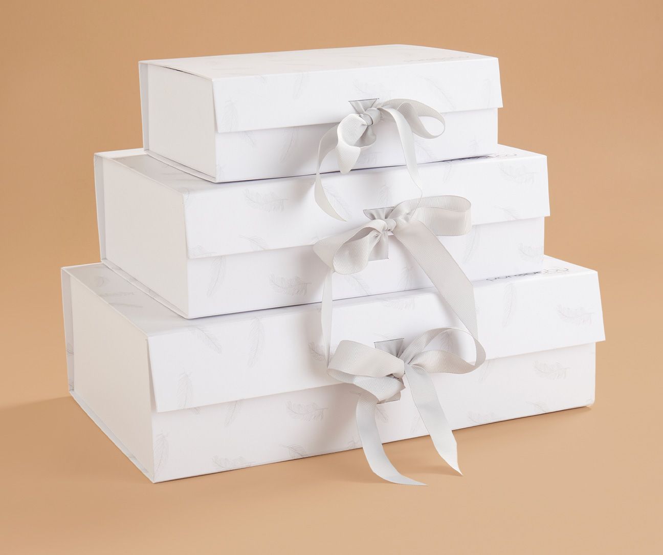 stack of Purebaby gift boxes
