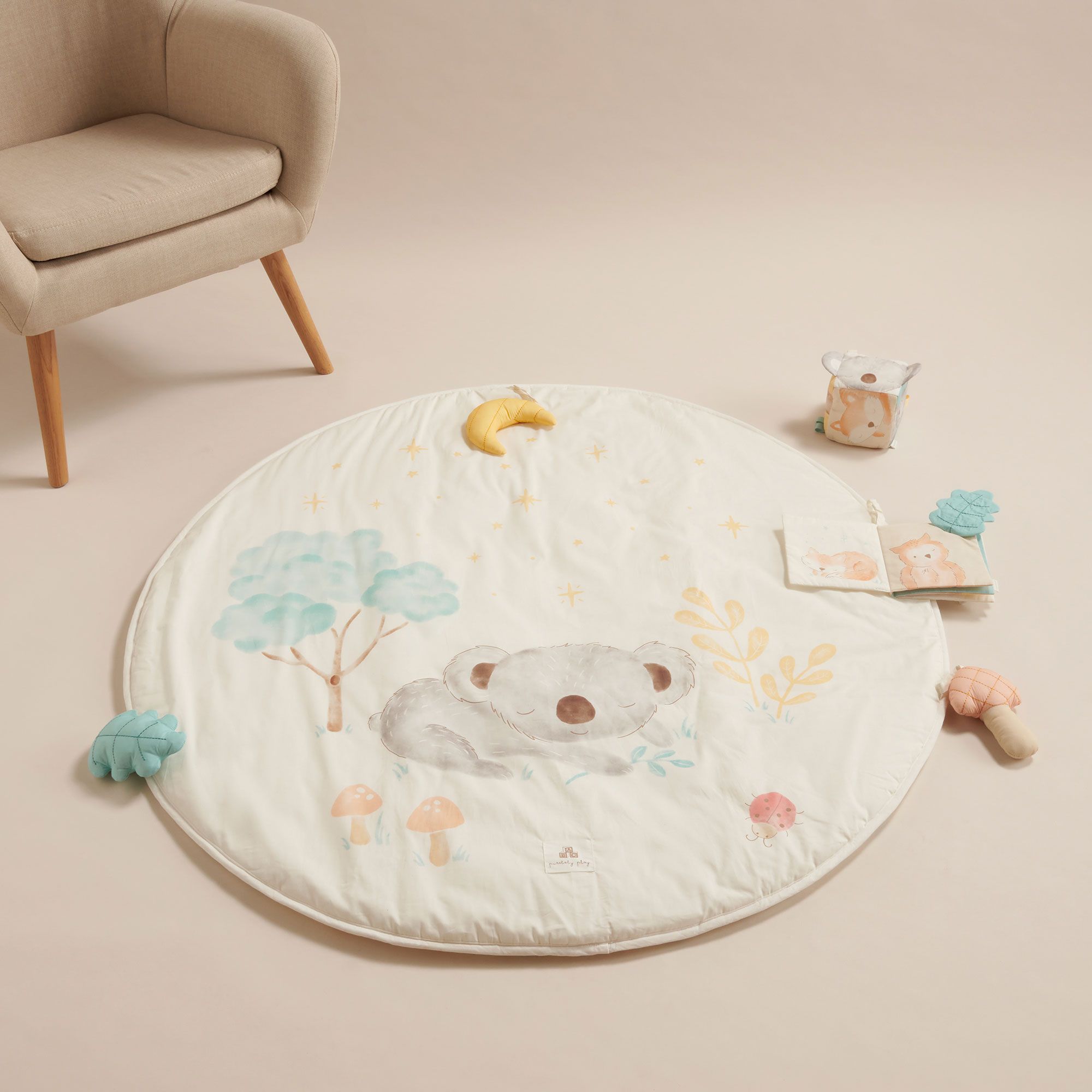 Organic sensory play mat laid out on nursery floor