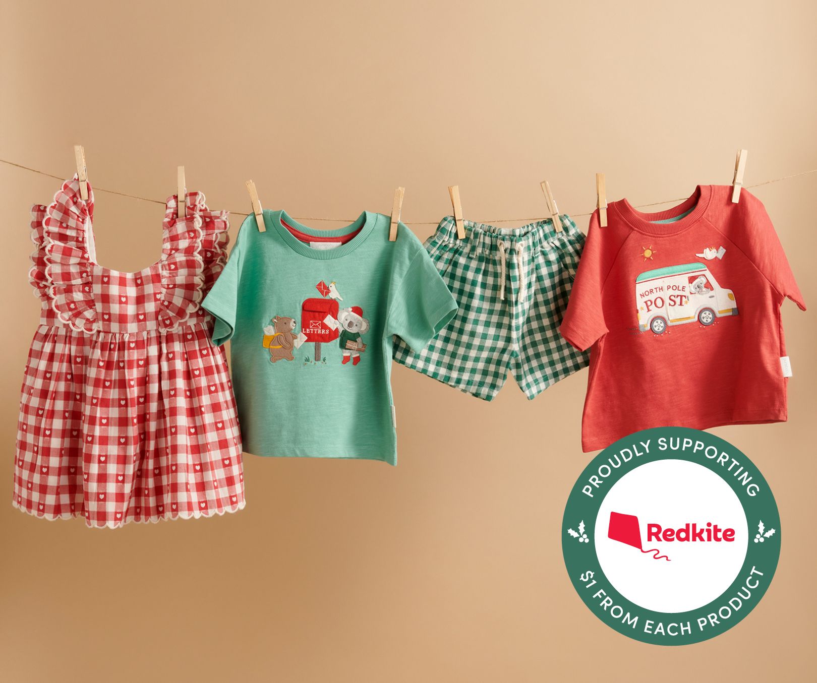 Purebaby Christmas collection hung in a line