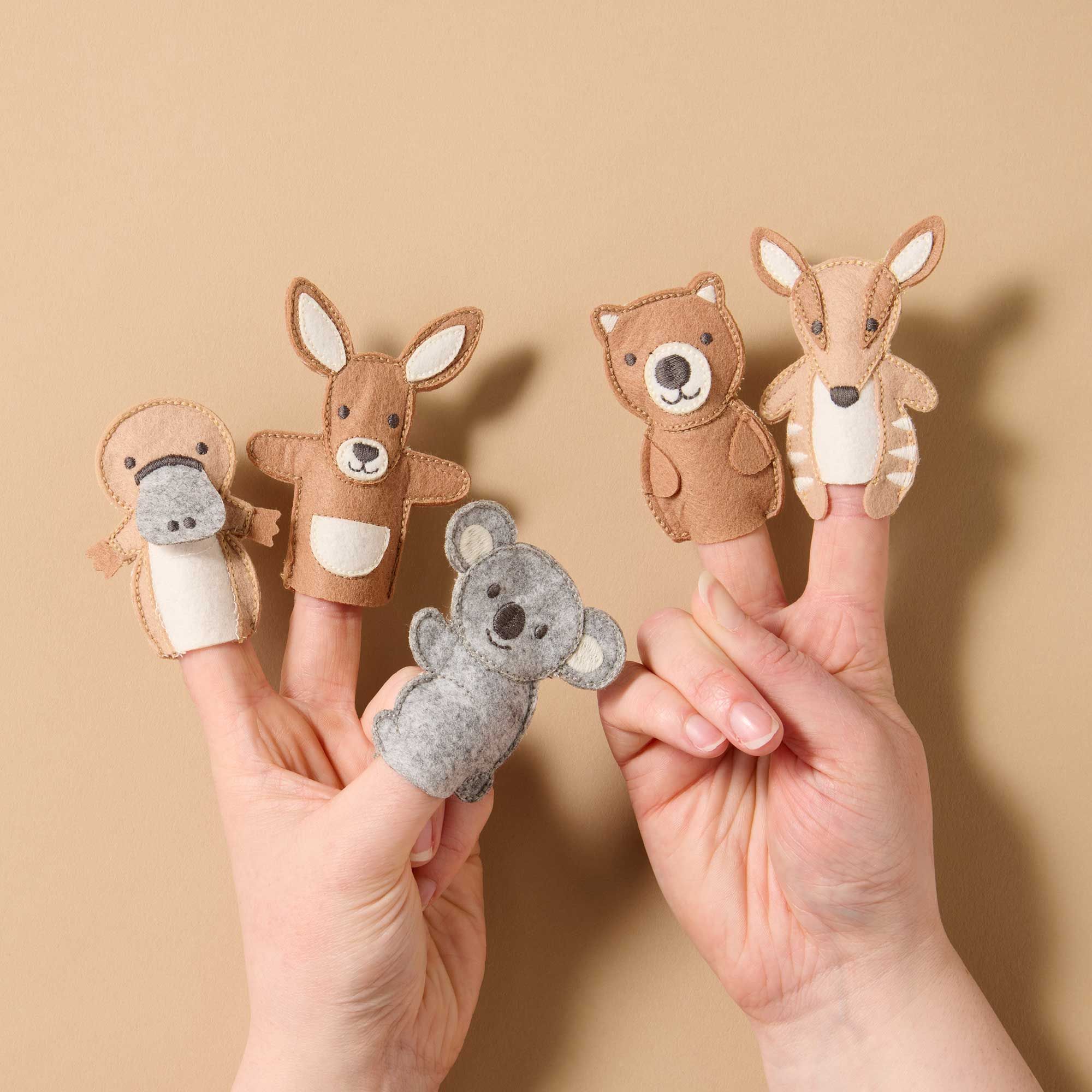 Australian native animal finger puppets on fingers