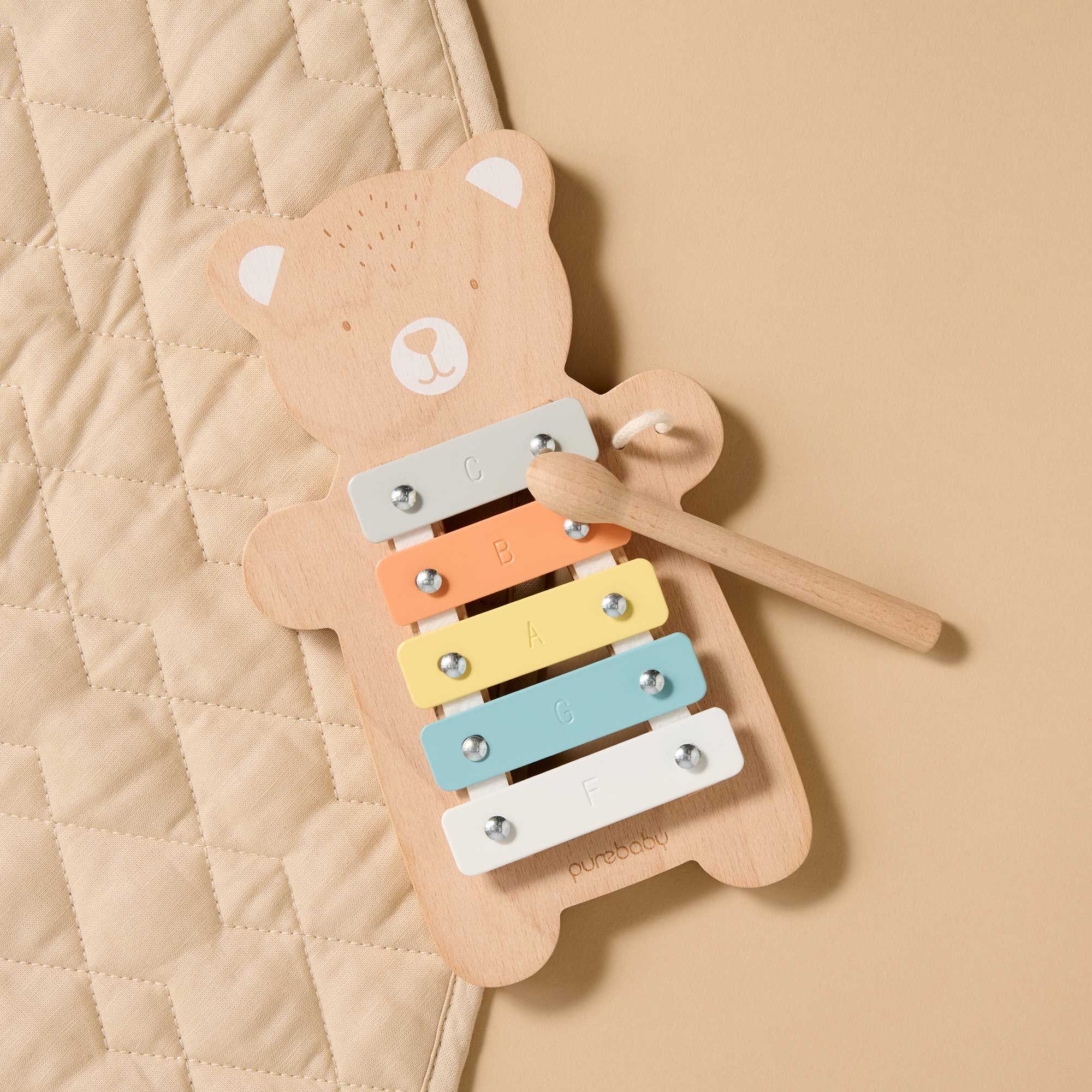 Purebaby bear xylophone toy on play mat