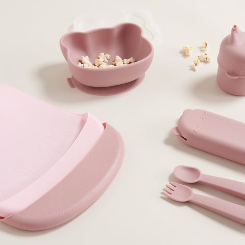 Pink silicone baby bib, bowel, cutlery and drink bottle 