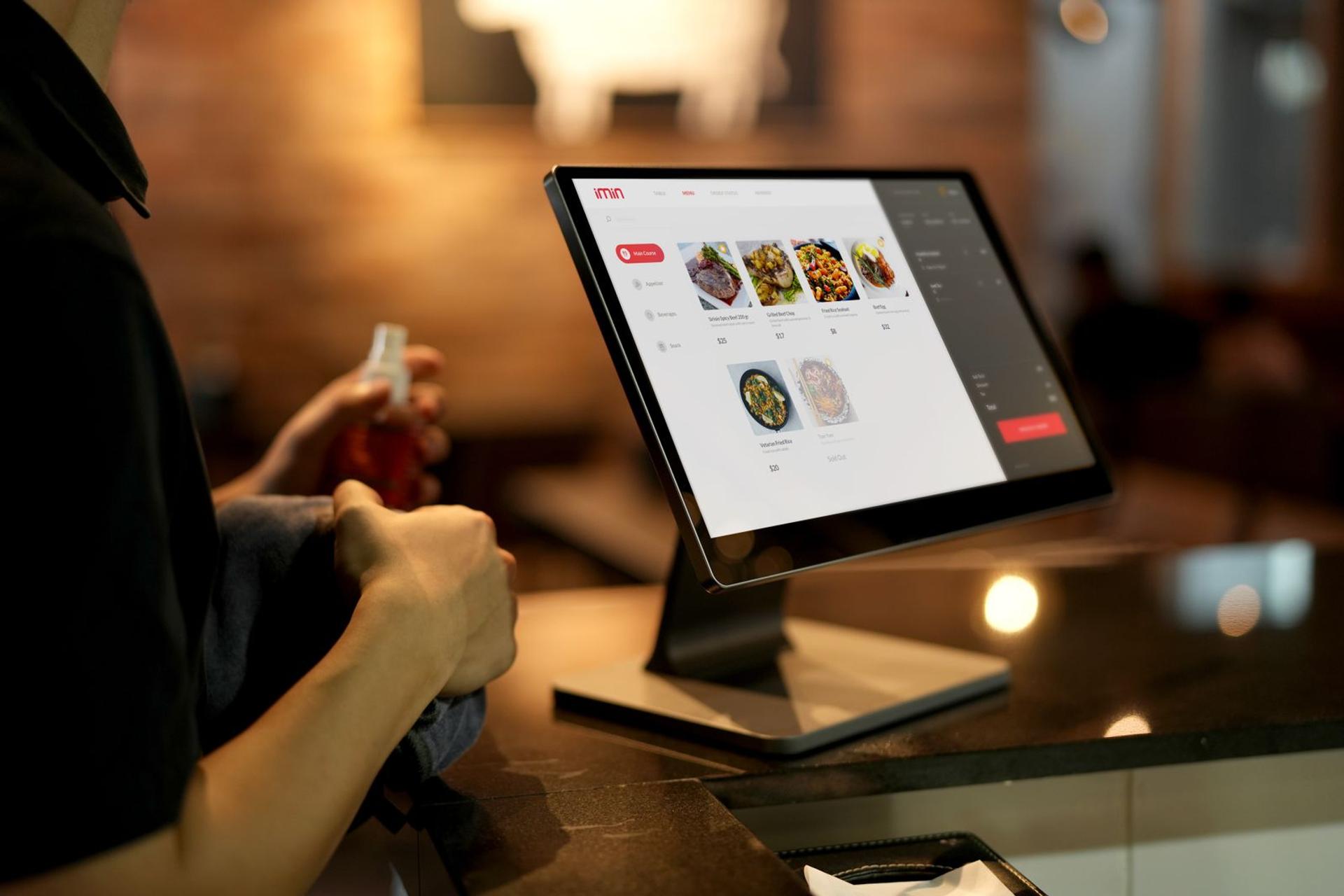 Digital ordering screen at a restaurant counter
