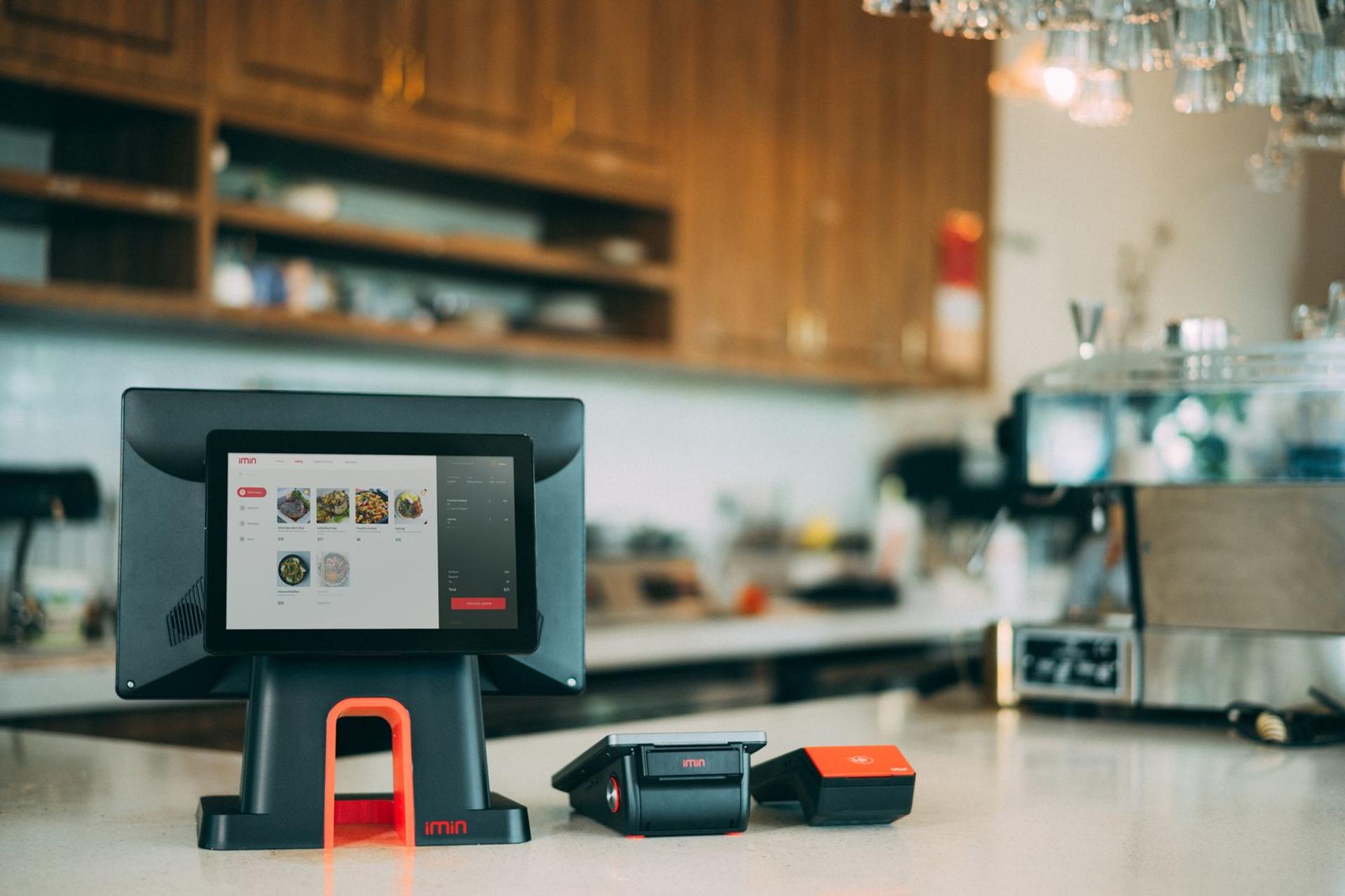 Digital ordering screen at a restaurant counter