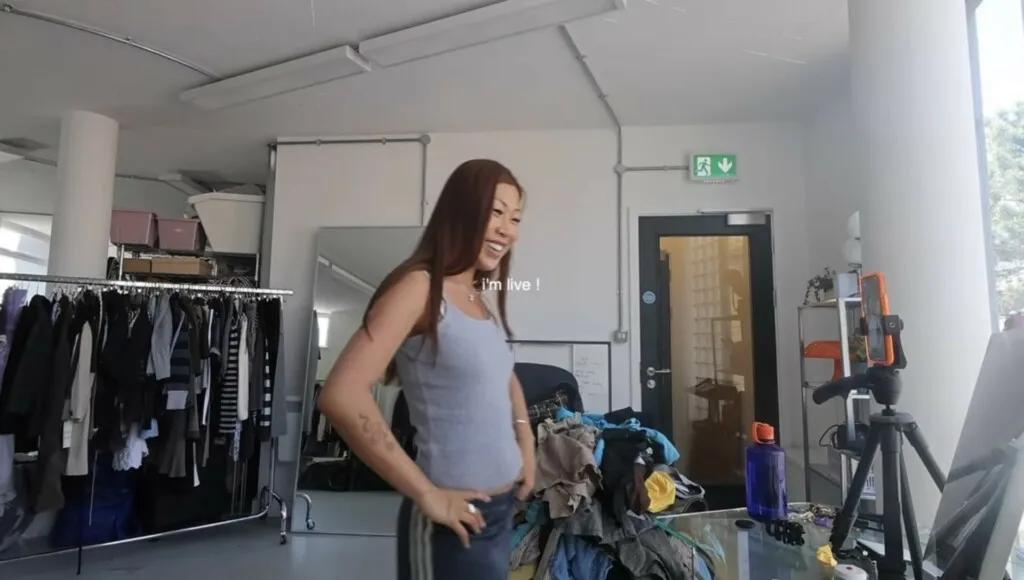 Vintage clothing on display at a live auction