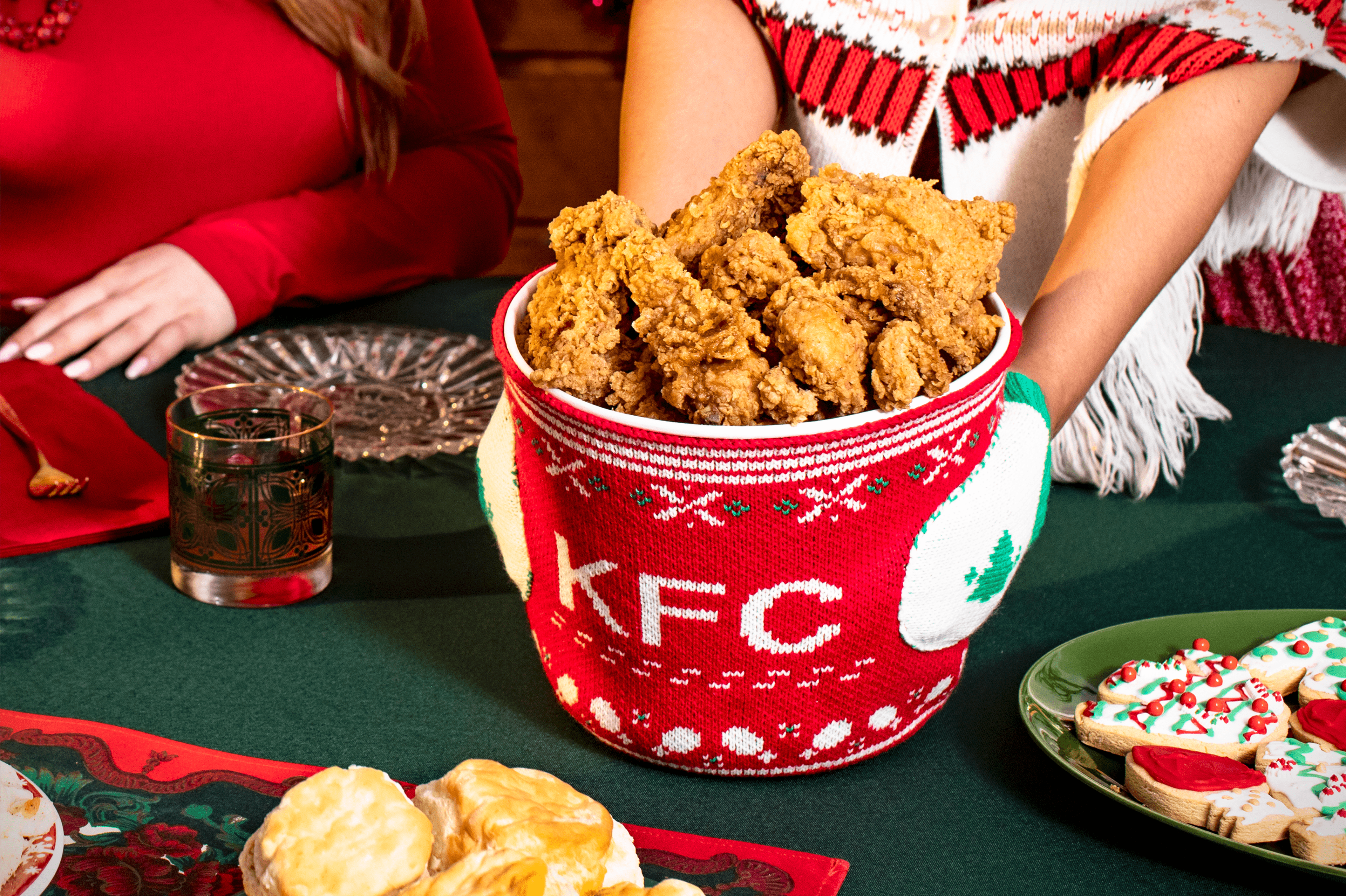 KFC Releases Limited-Edition "Finger Lickin' Chicken Mitten Bucket Hugger" And Holiday Bucket For Your Fried Chicken Festivities