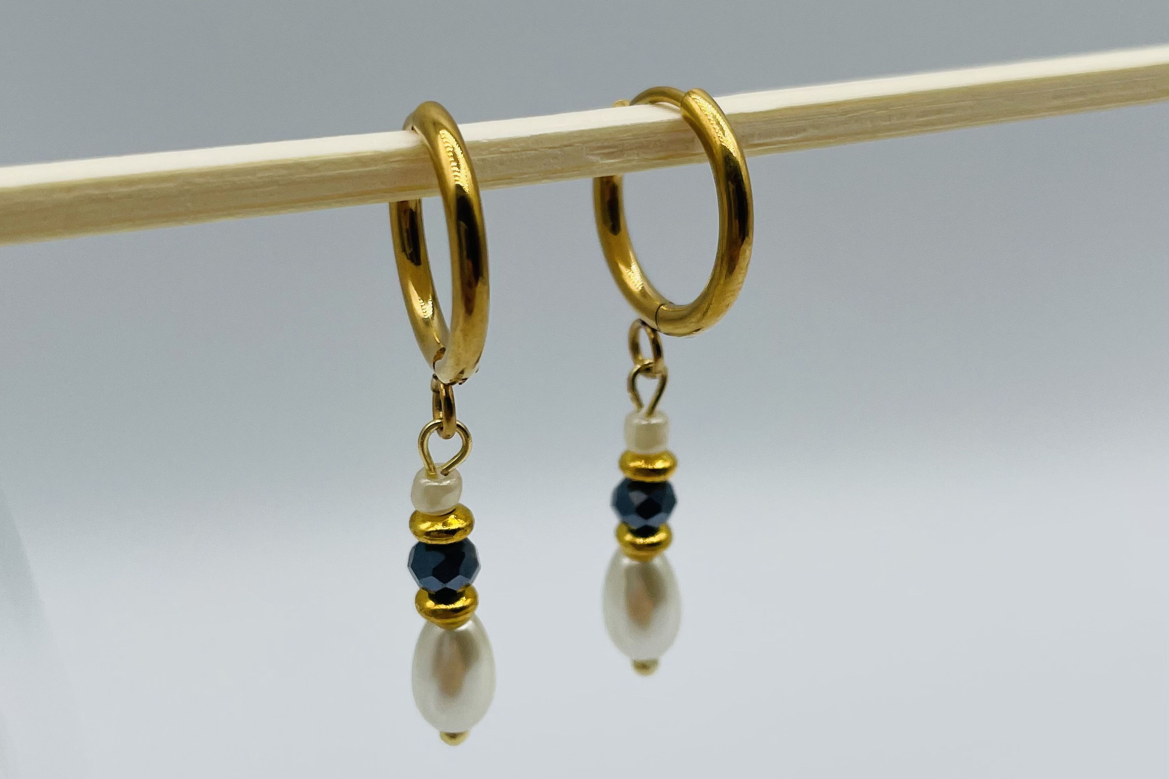 Mykonos gouden oorbellen met donkerblauw