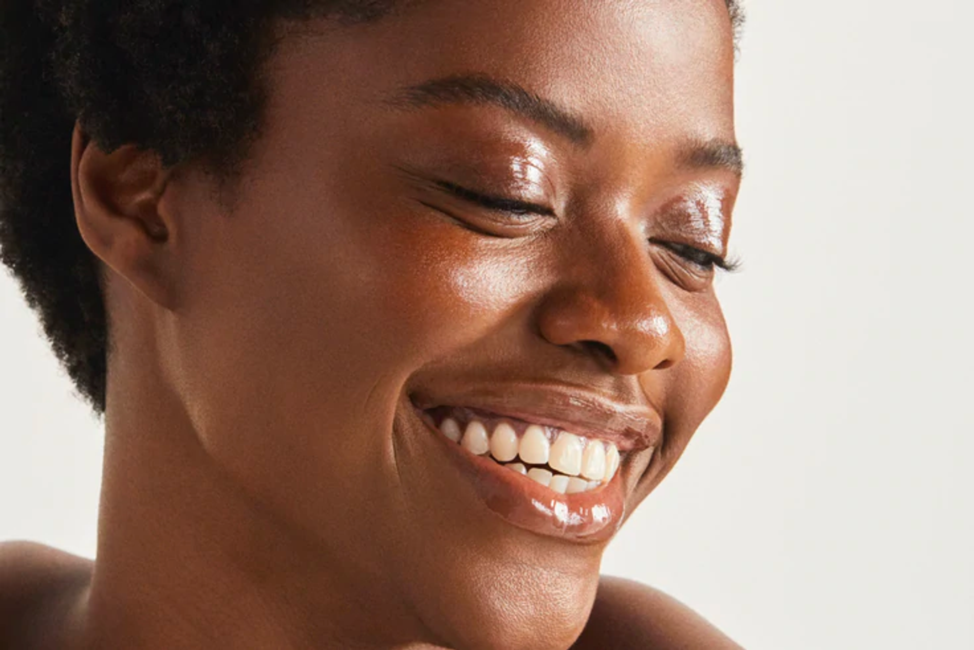 A young person with clear skin ready to start the day