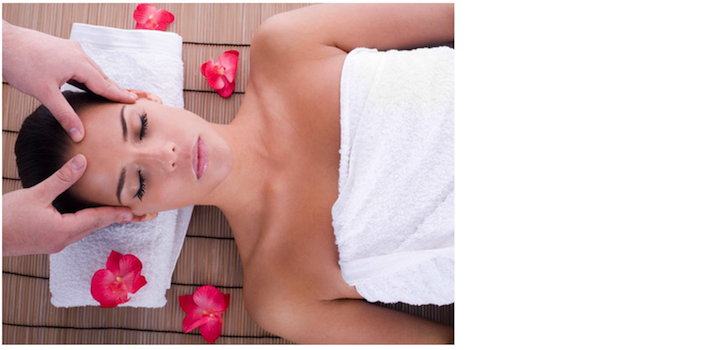 A woman receiving a relaxing facial massage