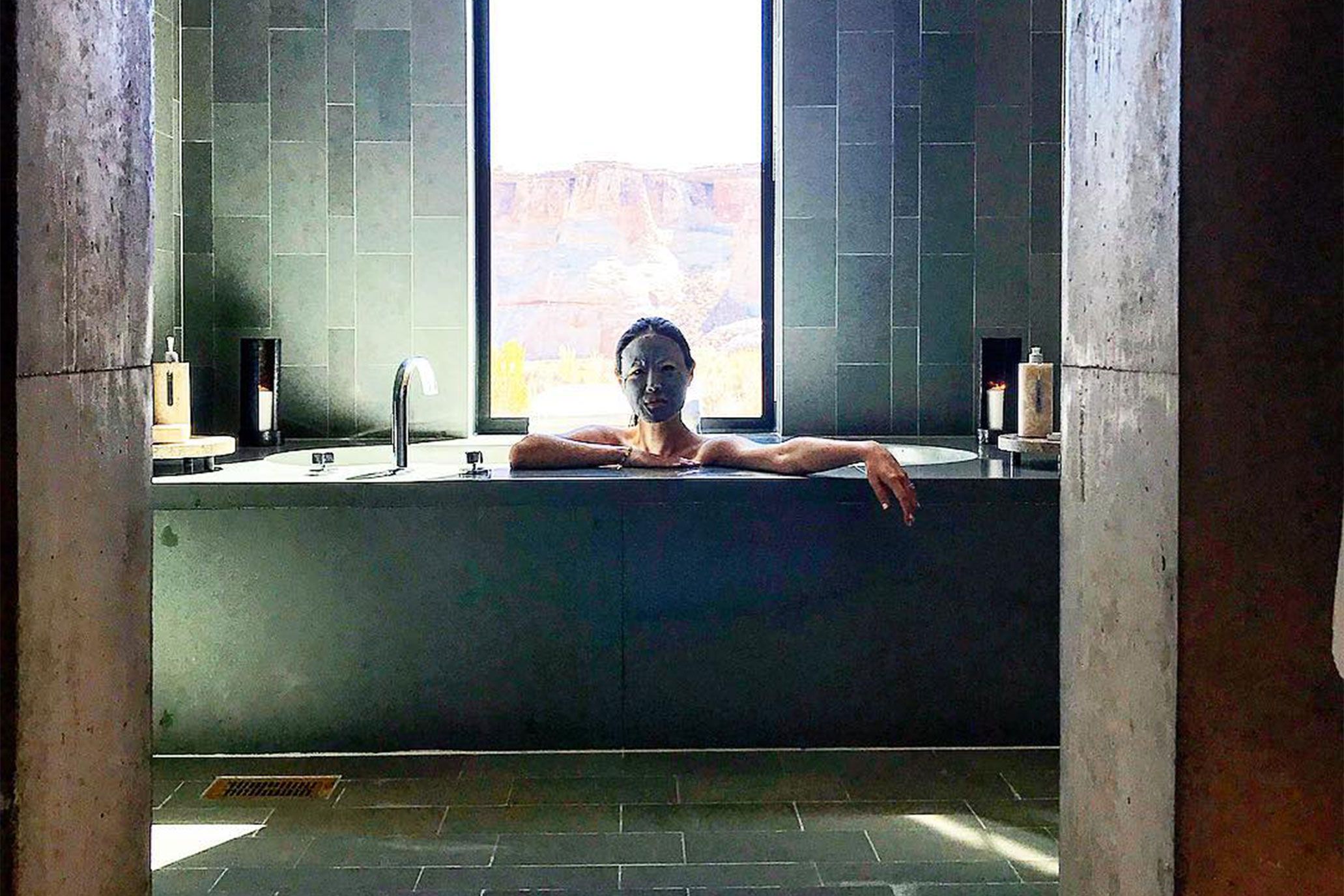 Alicia on a visit to Seoul, practicing the Korean “half-bath method”: Sit in a tub up to your belly button and keep arms out of water. Relax for 20 minutes. The cool upper half of the vs. the warm bottom half boosts circulation and energy. 