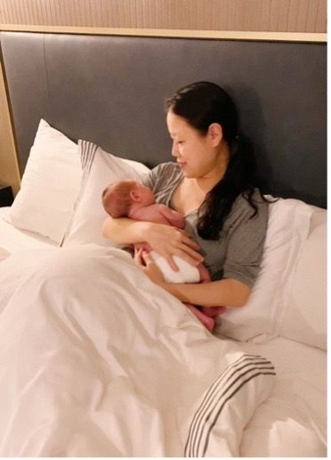 Boram Care in the bed with baby