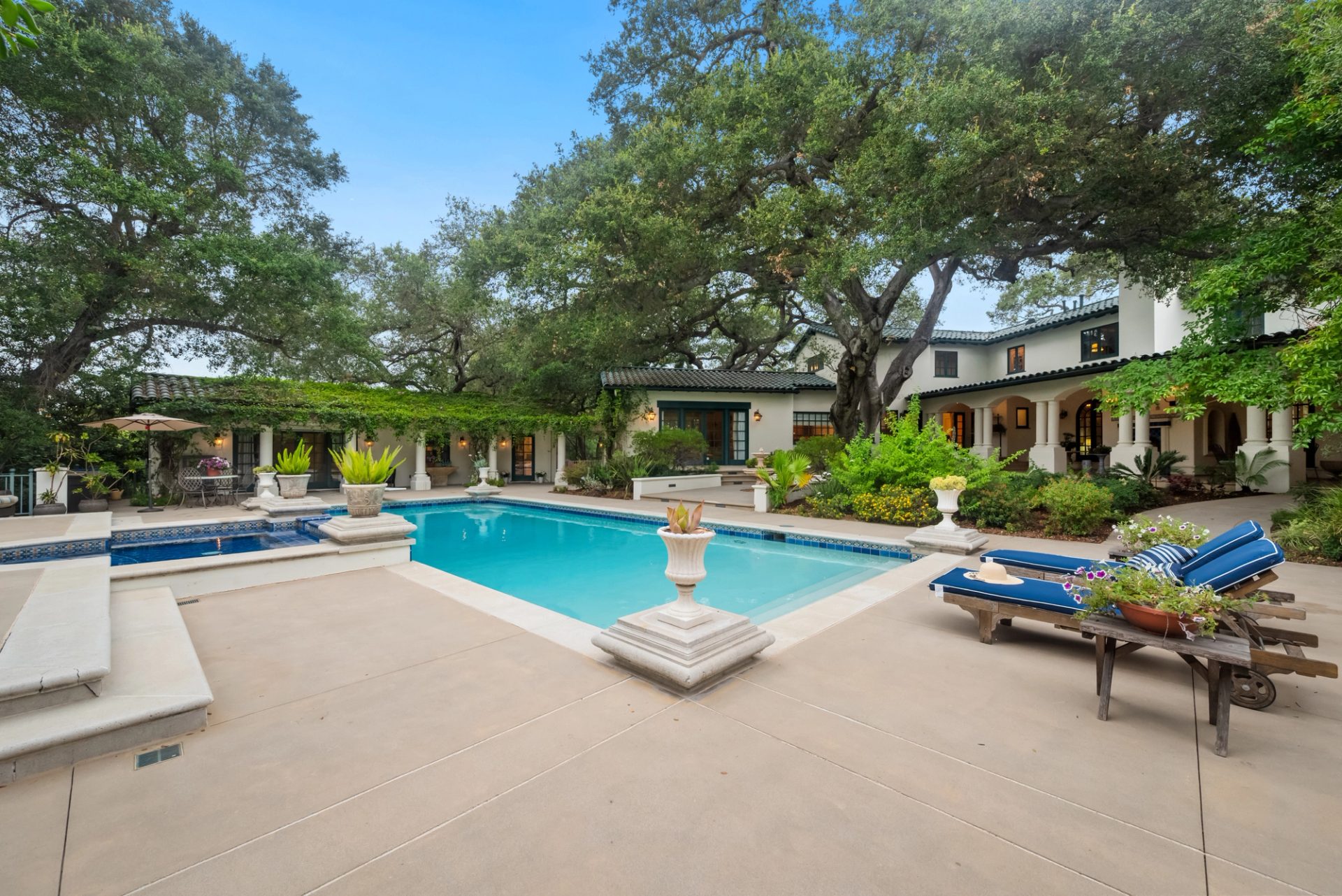 Grounds, pool, sport court, and gardens at 519 Meadow Grove