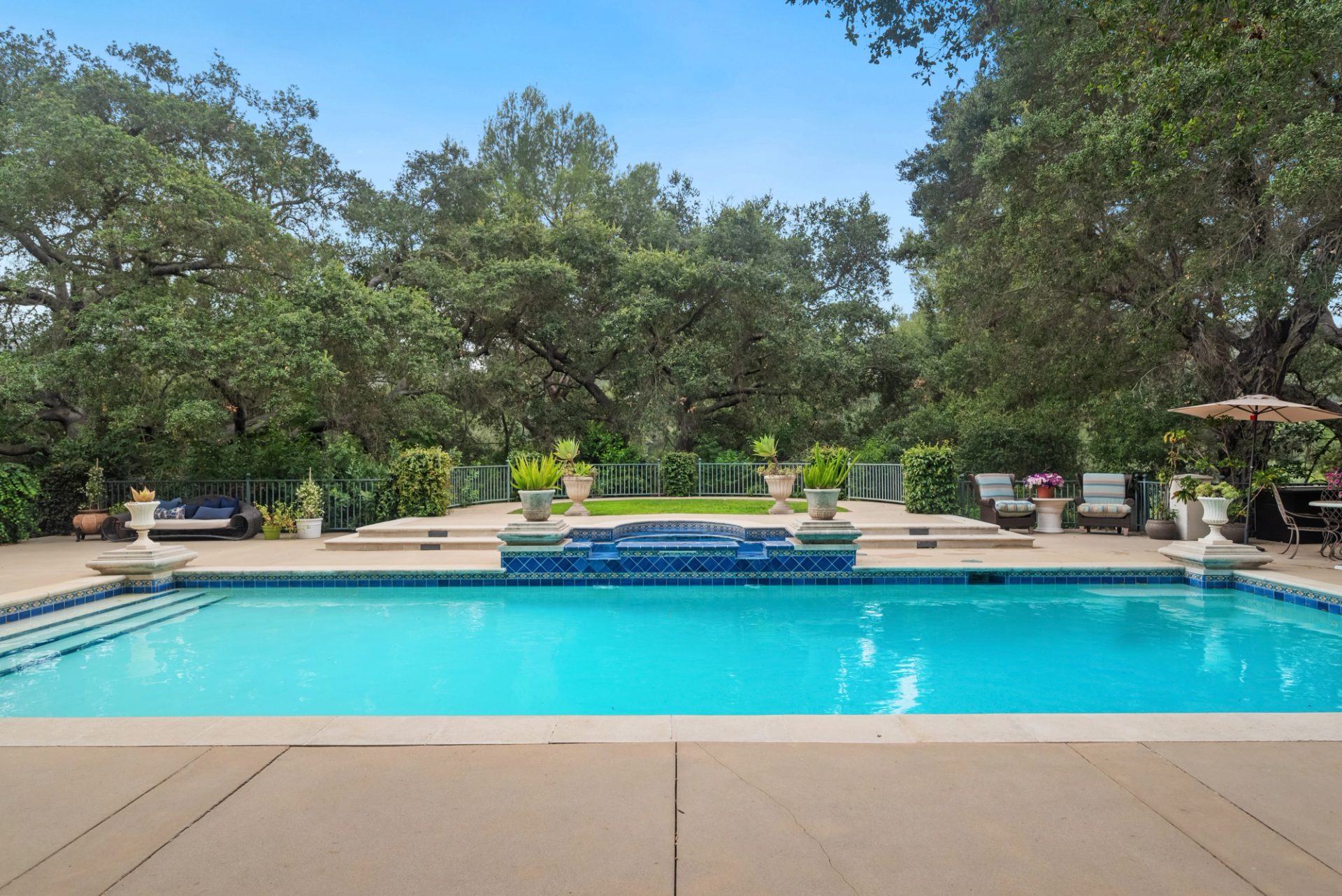 Grounds, pool, sport court, and gardens at 519 Meadow Grove