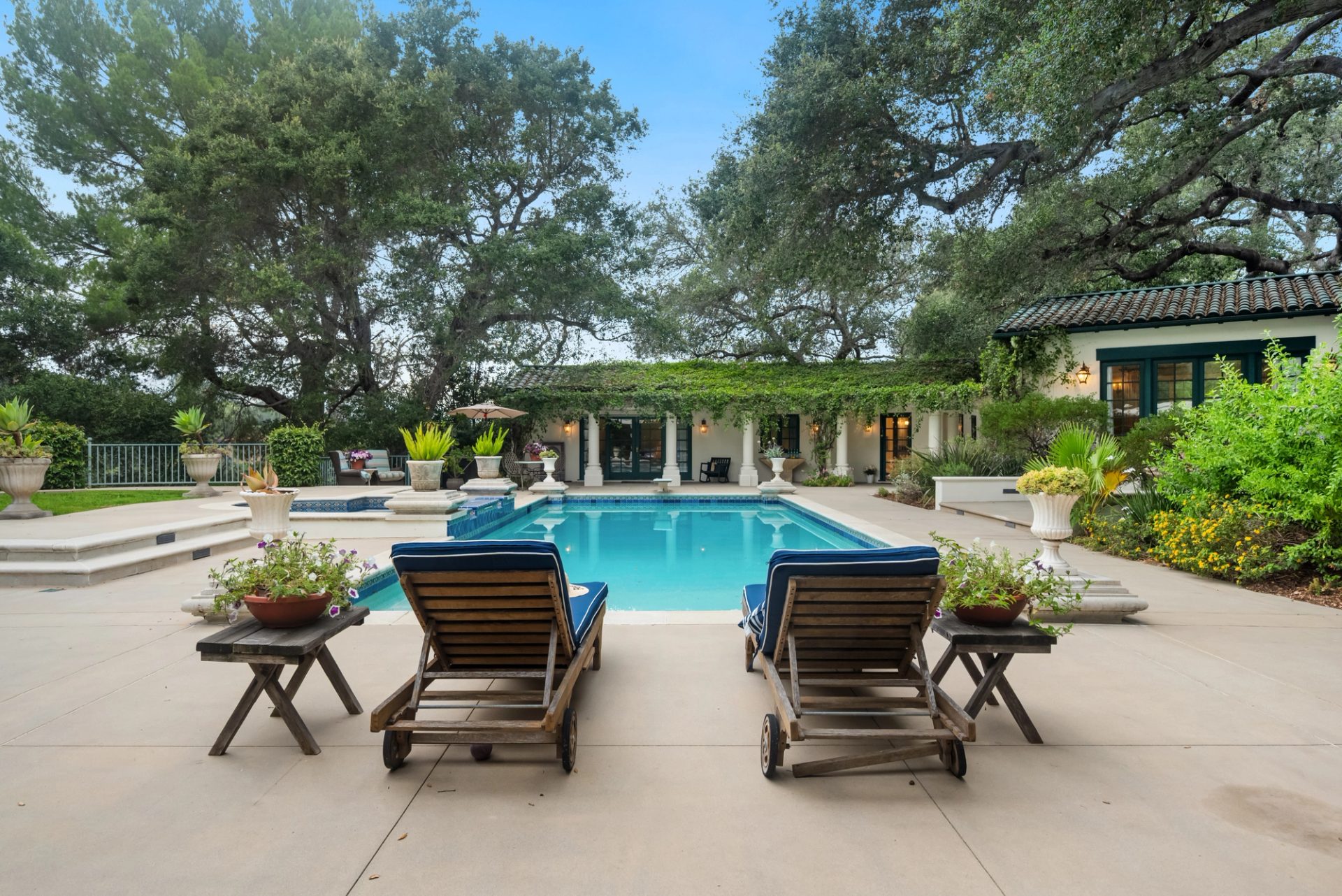 Grounds, pool, sport court, and gardens at 519 Meadow Grove