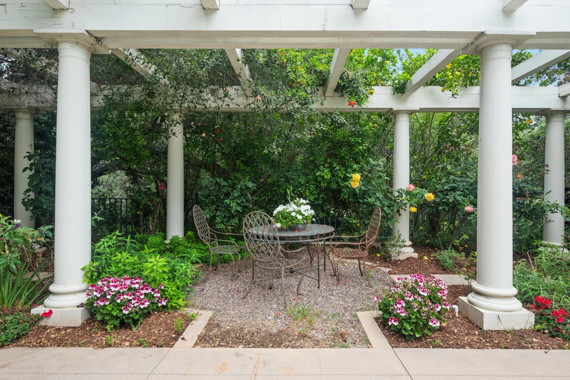 Grounds, pool, sport court, and gardens at 519 Meadow Grove