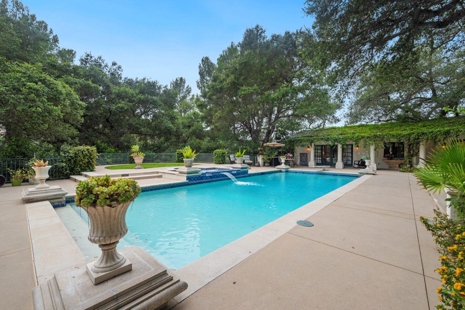 Grounds, pool, sport court, and gardens at 519 Meadow Grove