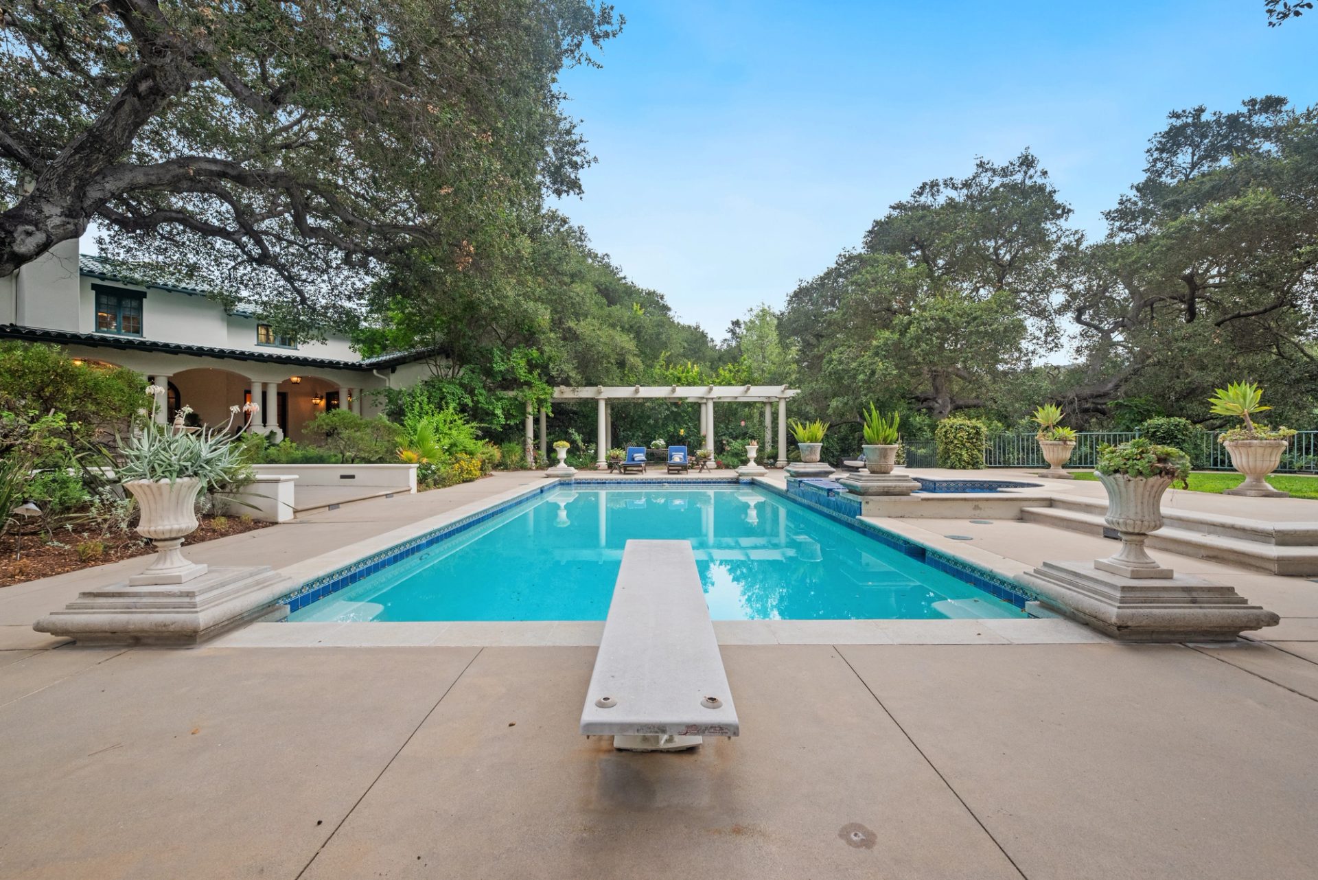 Grounds, pool, sport court, and gardens at 519 Meadow Grove