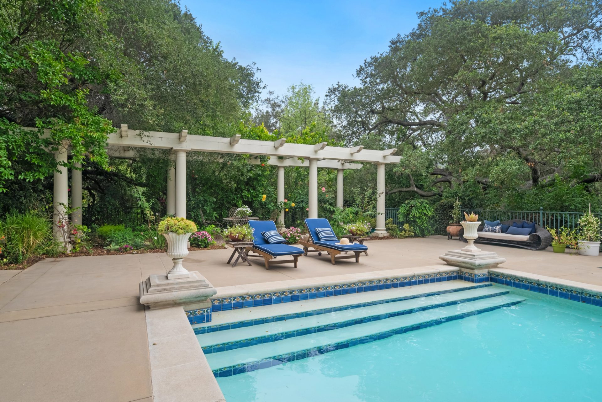 Grounds, pool, sport court, and gardens at 519 Meadow Grove
