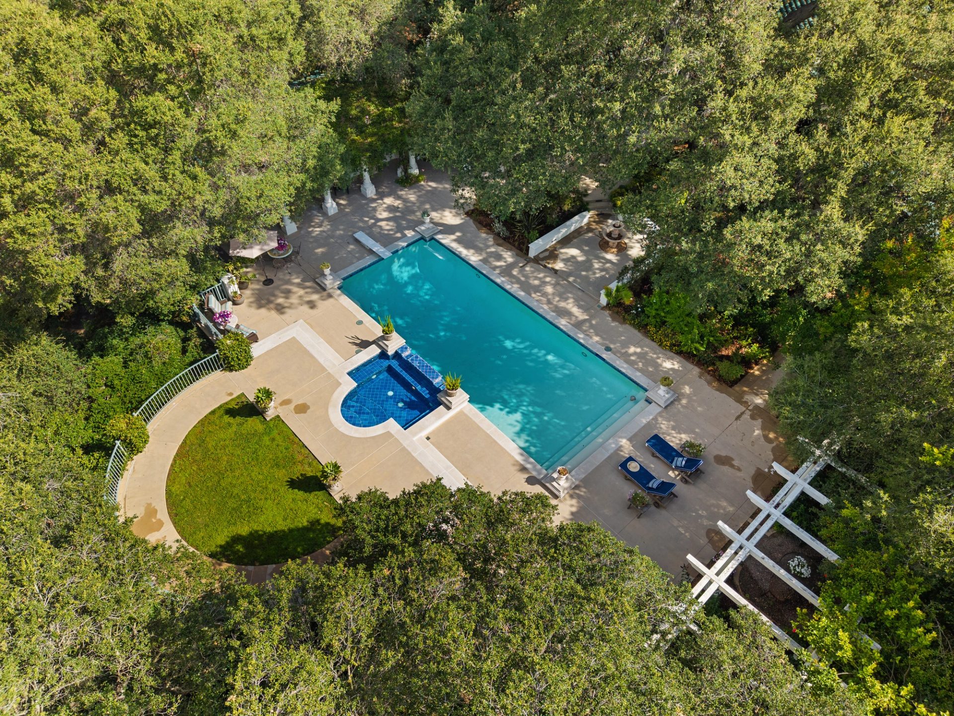 Grounds, pool, sport court, and gardens at 519 Meadow Grove