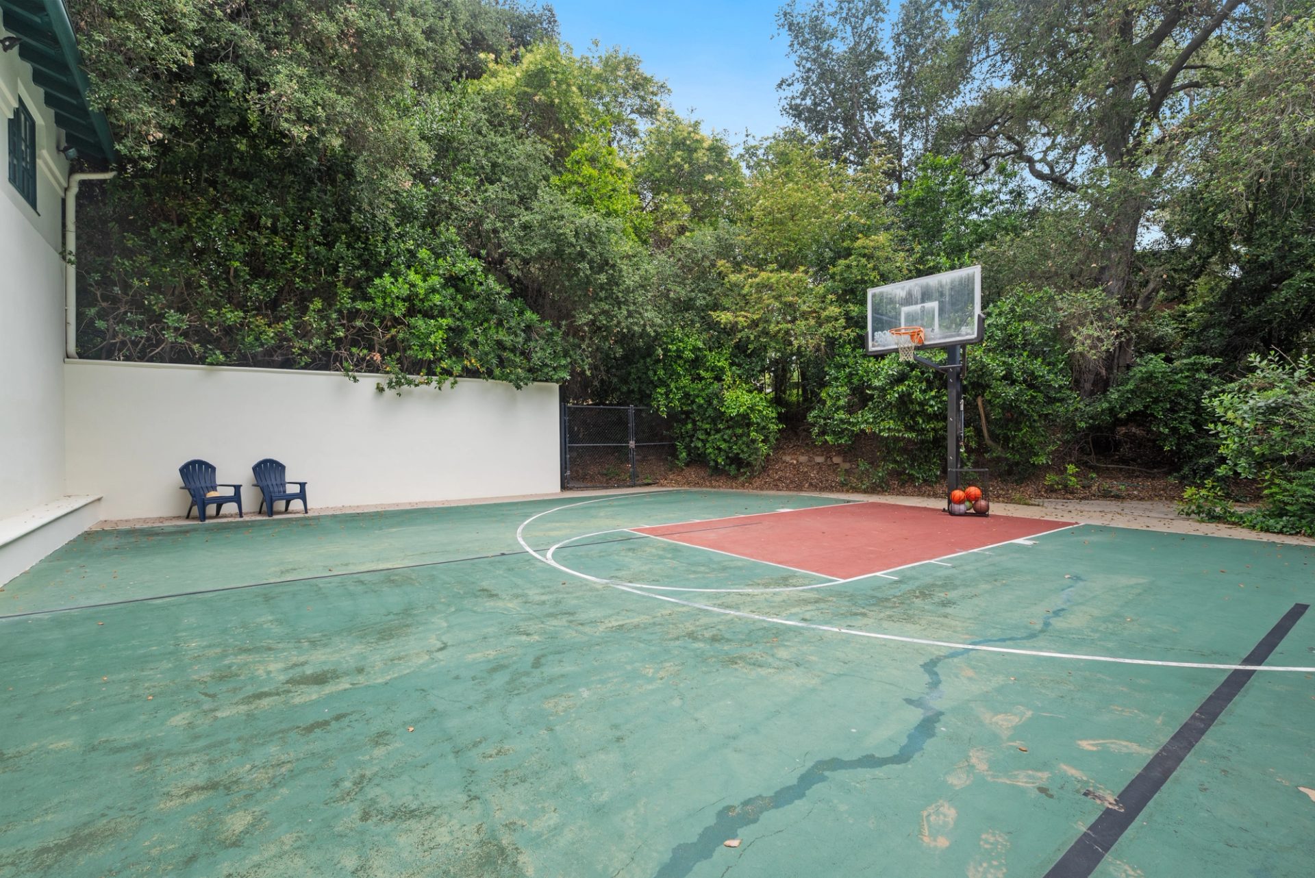 Grounds, pool, sport court, and gardens at 519 Meadow Grove