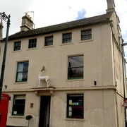 The White Hart in Bath: Front view of a historic inn, emanating charm and offering a warm and inviting atmosphere for guests
