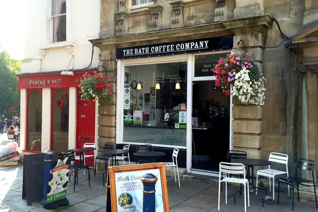 Bath Coffee Company in Bath: Front view of a cozy café with outdoor seating offering aromatic brews and a relaxing ambiance