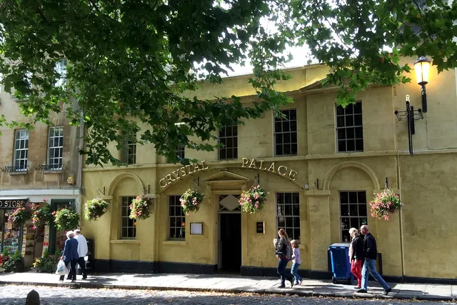 Crystal Palace Pub in Bath: Front view from Abbey Green, showcasing a historic pub with a vibrant atmosphere and lively surroundings