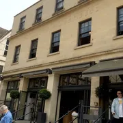 Hall and Woodhouse in Bath: Front entrance of a popular pub, known for its great food, drinks, and charming ambiance