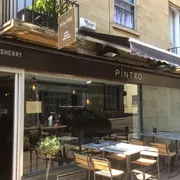 Pintxo in Bath: Front view with inviting outdoor seating, where patrons savour delectable tapas while enjoying the lively atmosphere