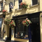 The Salamander in Bath: Front view of a cozy pub with a friendly ambiance, serving up great drinks and a warm atmosphere