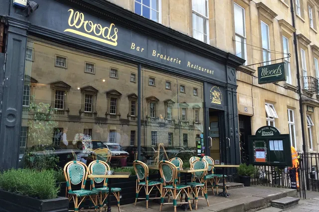 Woods in Bath: Striking front view of a contemporary restaurant, showcasing its modern design and inviting ambiance