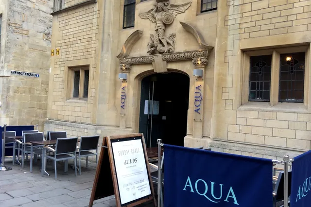 Aqua restaurant in Bath: The front view shows a modern and elegant ambiance with an outdoor seating area