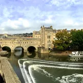 Pulteney Bridge and Weir with a Pulteney Cruise river boat