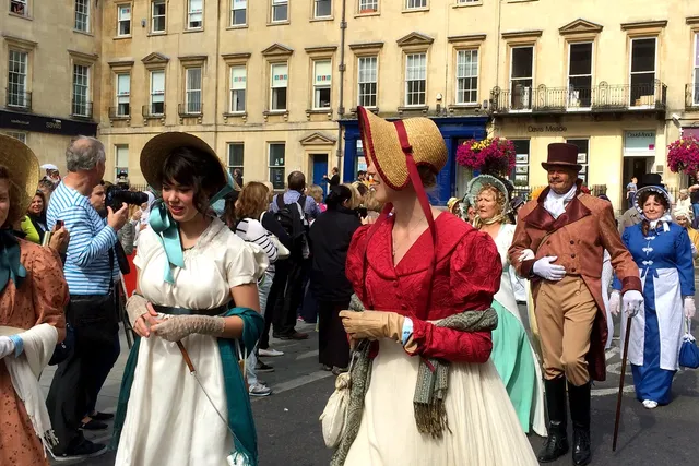 People in period guise celebrating Jane Austen Festival in Bath
