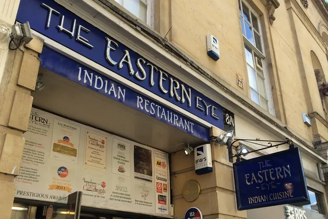 The Eastern Eye in Bath: Entrance signage showcasing the name of the restaurant, inviting guests to experience its authentic flavours and ambiance