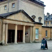 Assembly Rooms in Bath: Front view showcases a grand architectural beauty with iconic columns and a sense of historical charm