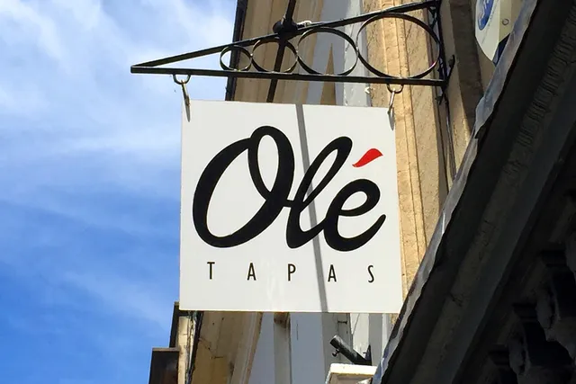 Ole in Bath: Signage view, inviting guests to savour authentic flavours and experience the vibrant atmosphere of this Spanish eatery